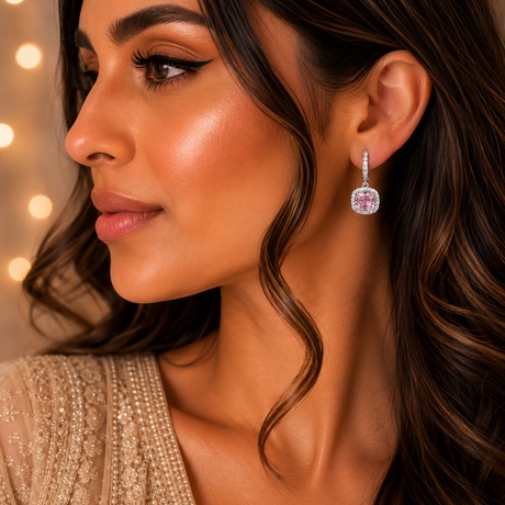Close-up of a woman wearing a sparkling earring with a blurred background