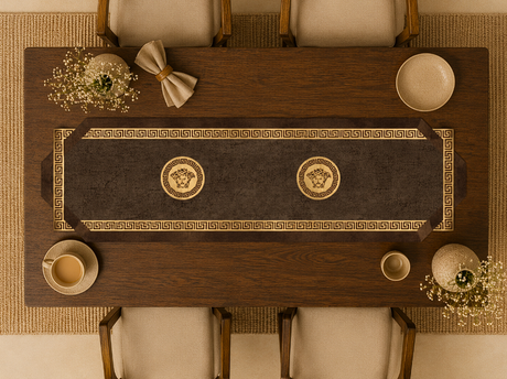 Wooden table with decorative placemats and cups on a textured surface