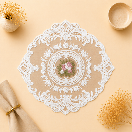 Decorative lace doily with floral embroidery on a beige surface