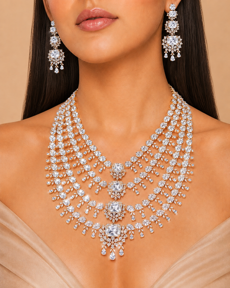 Close-up of a woman wearing an elaborate diamond necklace and earrings on a beige background