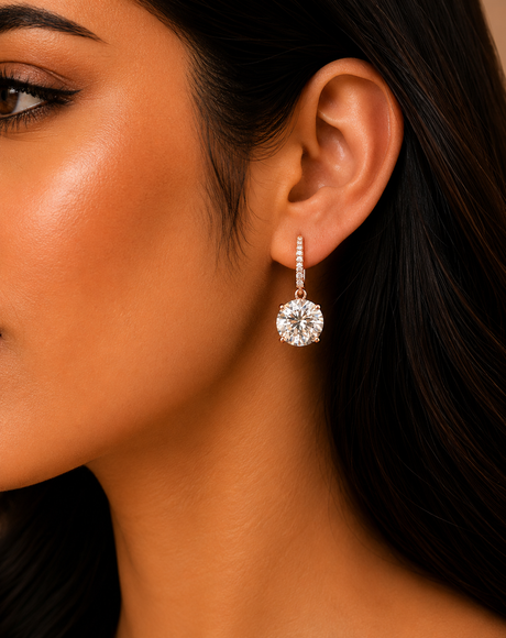 Close-up of a woman wearing a diamond earring with a blurred background