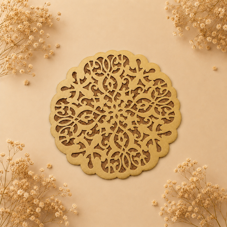 Decorative wooden wall art with intricate cut-out patterns on a beige background with dried flowers.