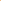 Pair of gold earrings with intricate designs on a peach background