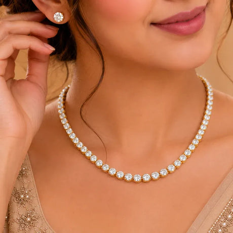 18K gold-plated CZ necklace set with stud earrings worn with Indian occasion wear
